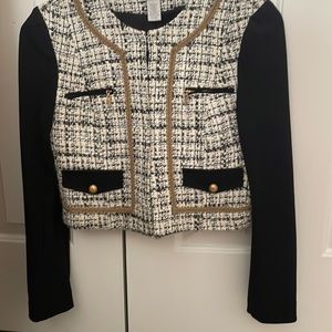 Womens size 4 short black, white and gold blazer.